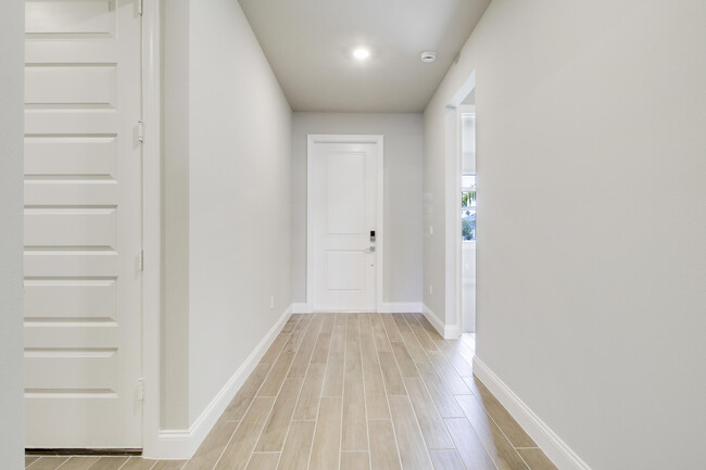 Building Photo - 8990 Dahlia Cir