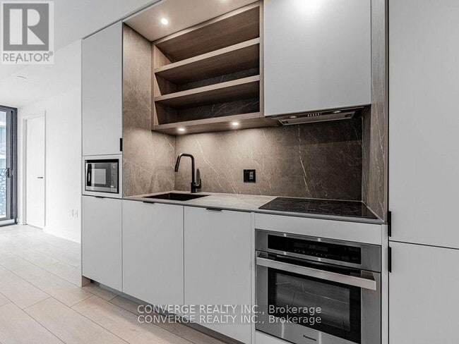 Building Photo - 55 Charles St E