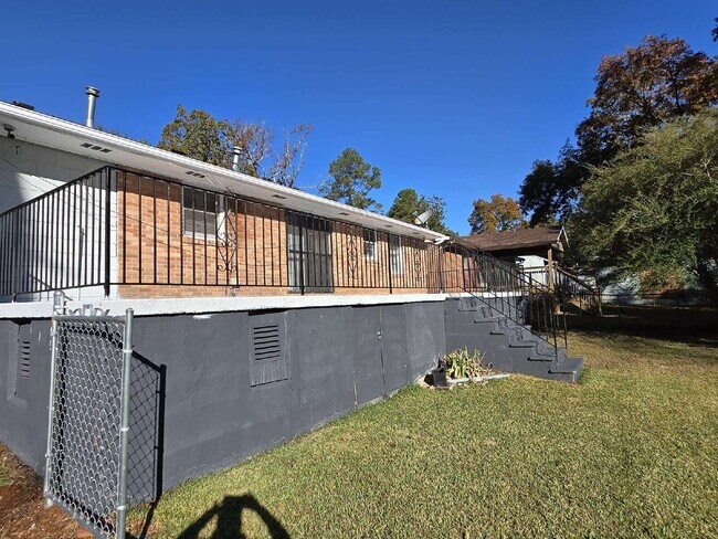 Photo - Charming 4-Sided Brick Oasis with Fenced Yard & Hardwood Floors in Atlanta!" Apartment