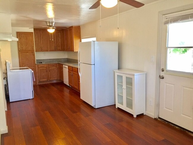 hardwood floor kitchen w/ dishwasher. Dining area in kitchen - 1839 San Luis Rd