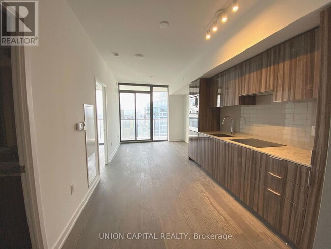 Building Photo - 11 Wellesley St W