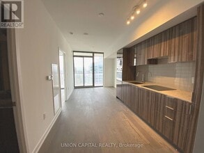 Building Photo - 11 Wellesley St W