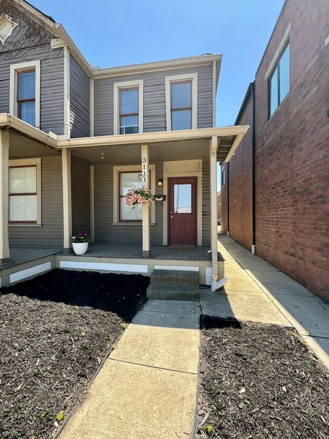 Building Photo - 311-313-313 E 5th Ave