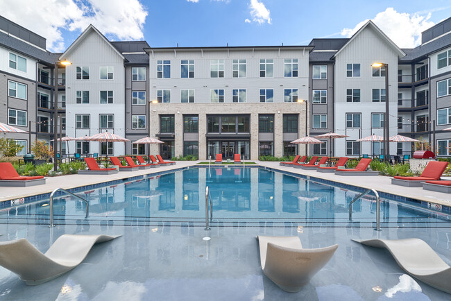 Resort-style Swimming Pool with Tanning Ledge and Sundeck - Bexley West Creek