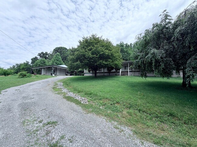 Building Photo - Secluded 3-Bedroom with Wrap-Around Porch -- Jonesborough