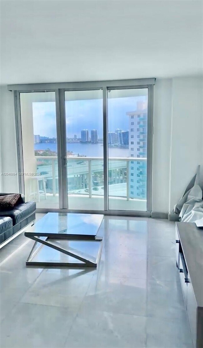 Building Photo - 19380 Collins Ave