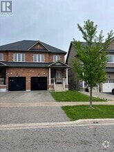 Building Photo - 101 Paperbark Ave