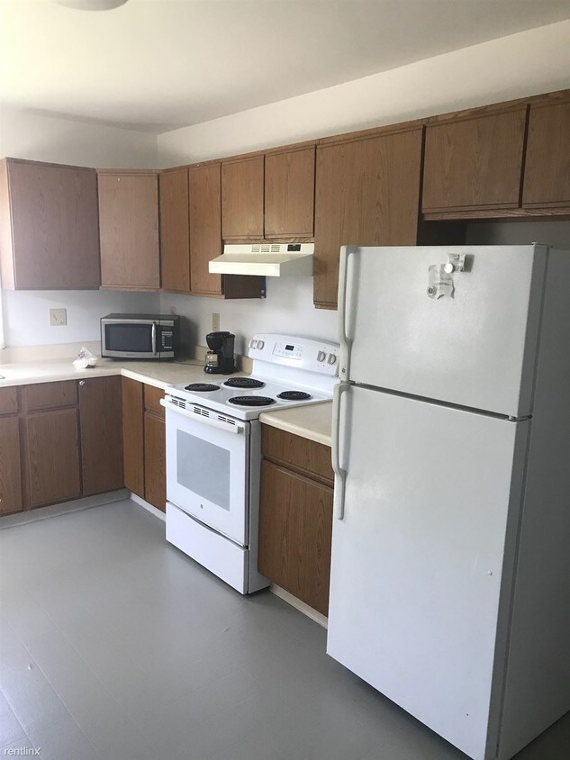 Building Photo - 4 br, 1.5 bath House - 401 W Grand River Ave