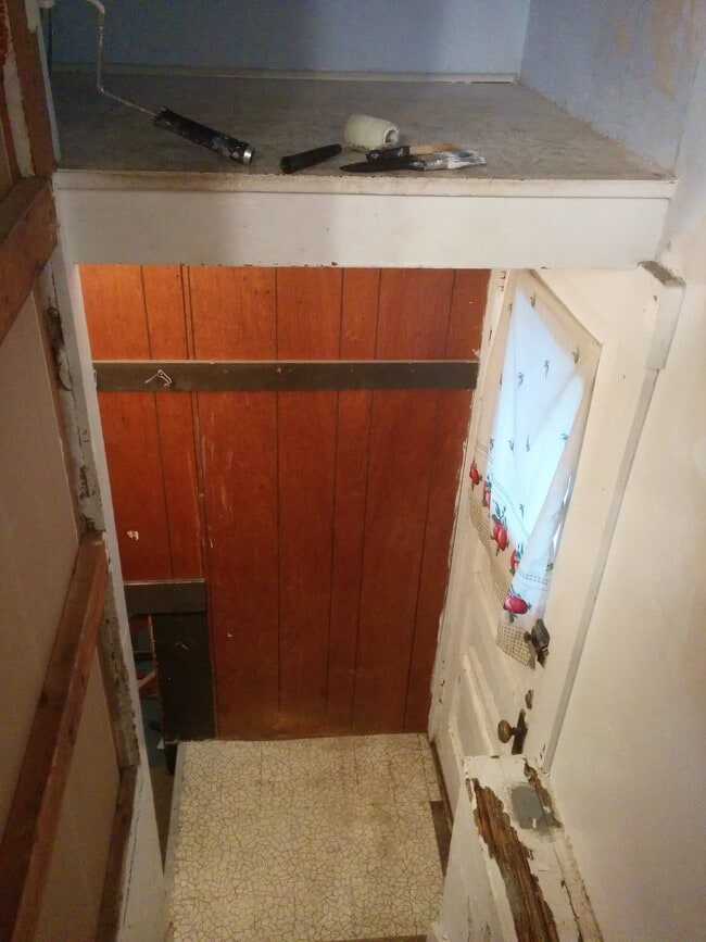 Stairs down to the basement. - 1139 Illinois Avenue