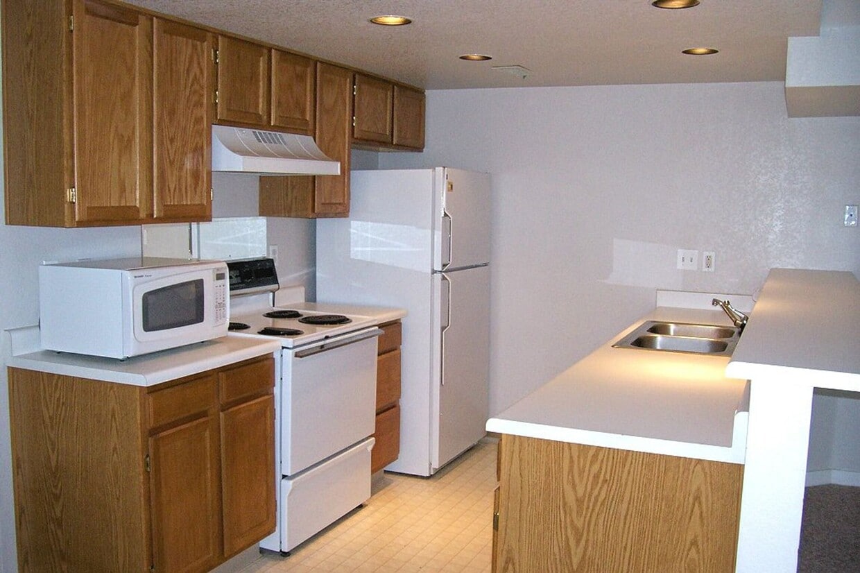 Building Photo - Comfortable Condo Near CSU