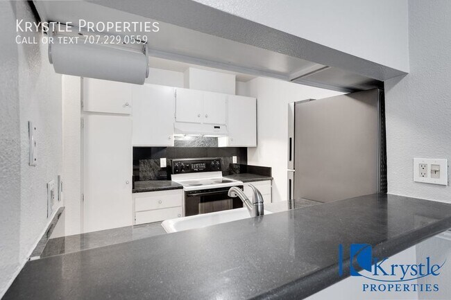 Foto del edificio - Cozy Condo Charm with Scenic Patio Views a...