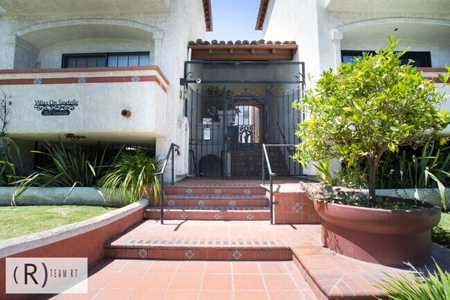 Building Photo - Charming 2-Bed, 2-Bath Spanish-Style Condo in Desirable Mar Vista