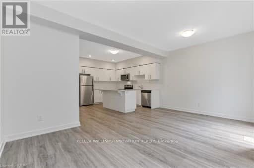 Photo du bâtiment - 110-110 Fergus Ave