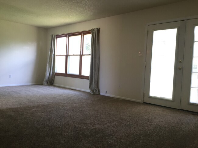 living room (double door to backyard on the right) - 2409 E 16th St