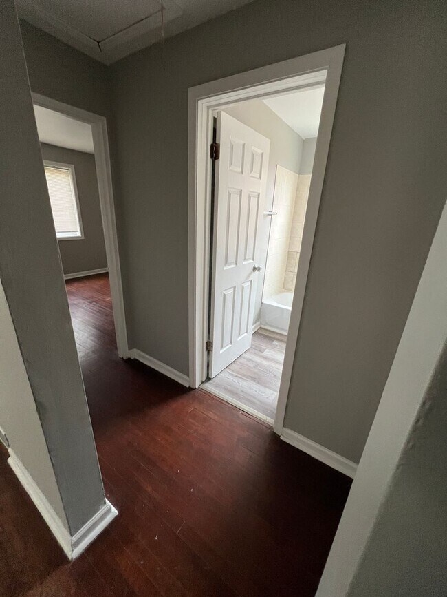 Building Photo - This recently updated raised brick-ranch h...