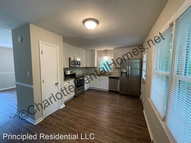 Building Photo - 3 br, 2.5 bath House - 7201 Pathfinder Ct