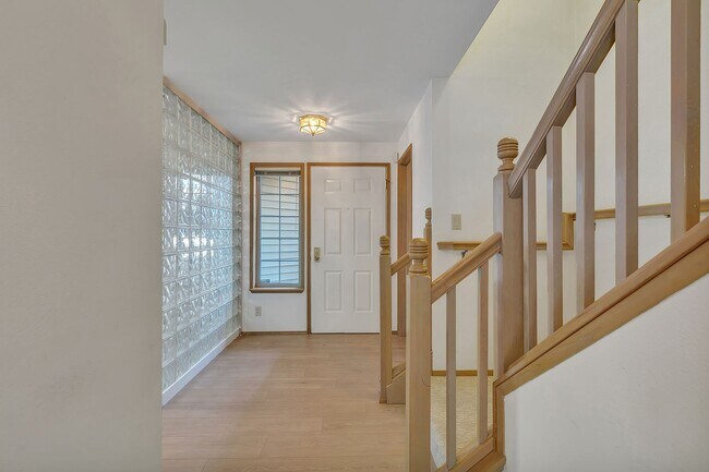 Building Photo - Privately placed, end unit townhome, brand...