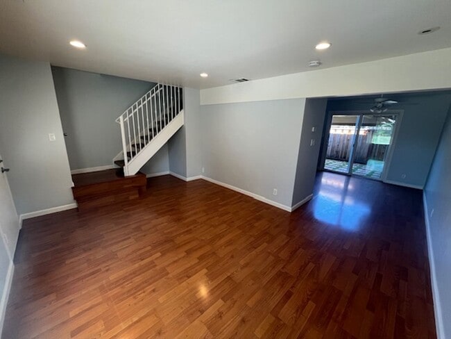 Building Photo - PETS OK!  2-story townhome with 2 bedrooms...