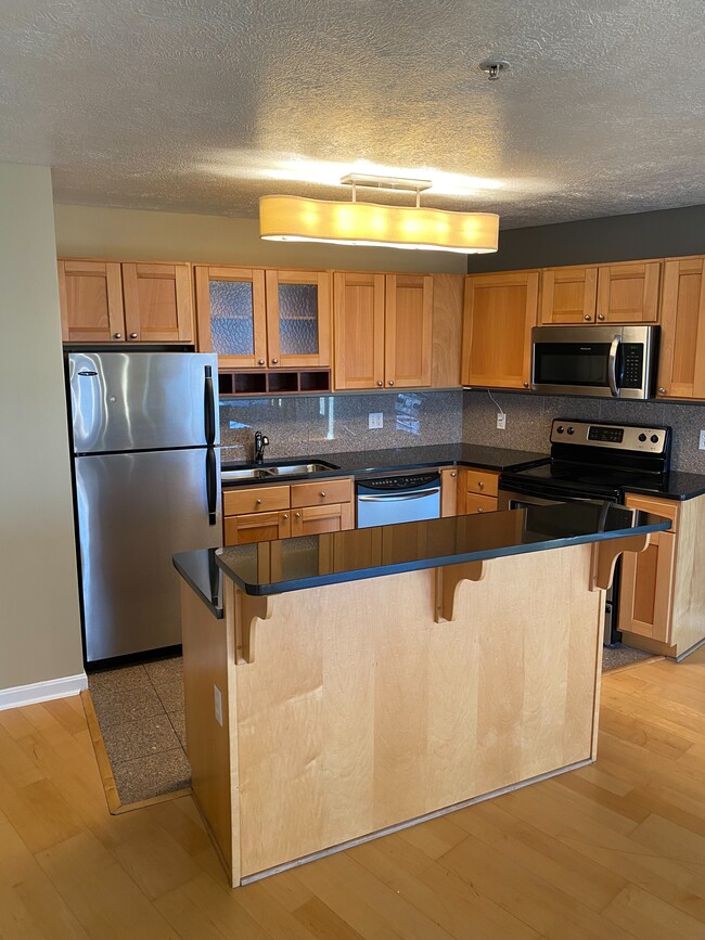 Full Stainless Steel Kitchen with Granite Countertops and Marble Floors - 2222 Detroit Ave