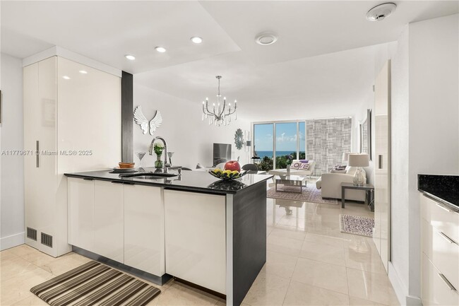 Building Photo - 10275 Collins Ave