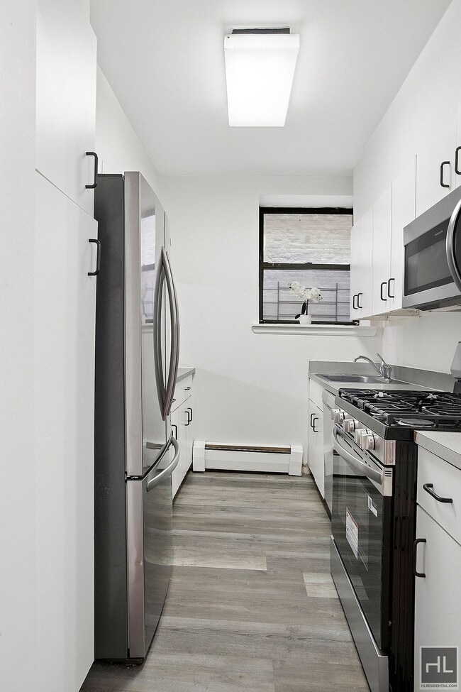 Building Photo - Steps to Central Park & Subways: Massive Kingsize 1BR at St Nicholas Court Condominium