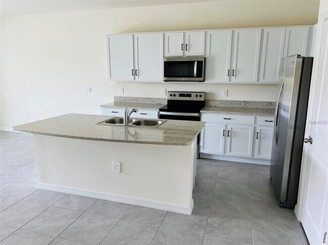 Foto del edificio - 8821 Milestone Dr