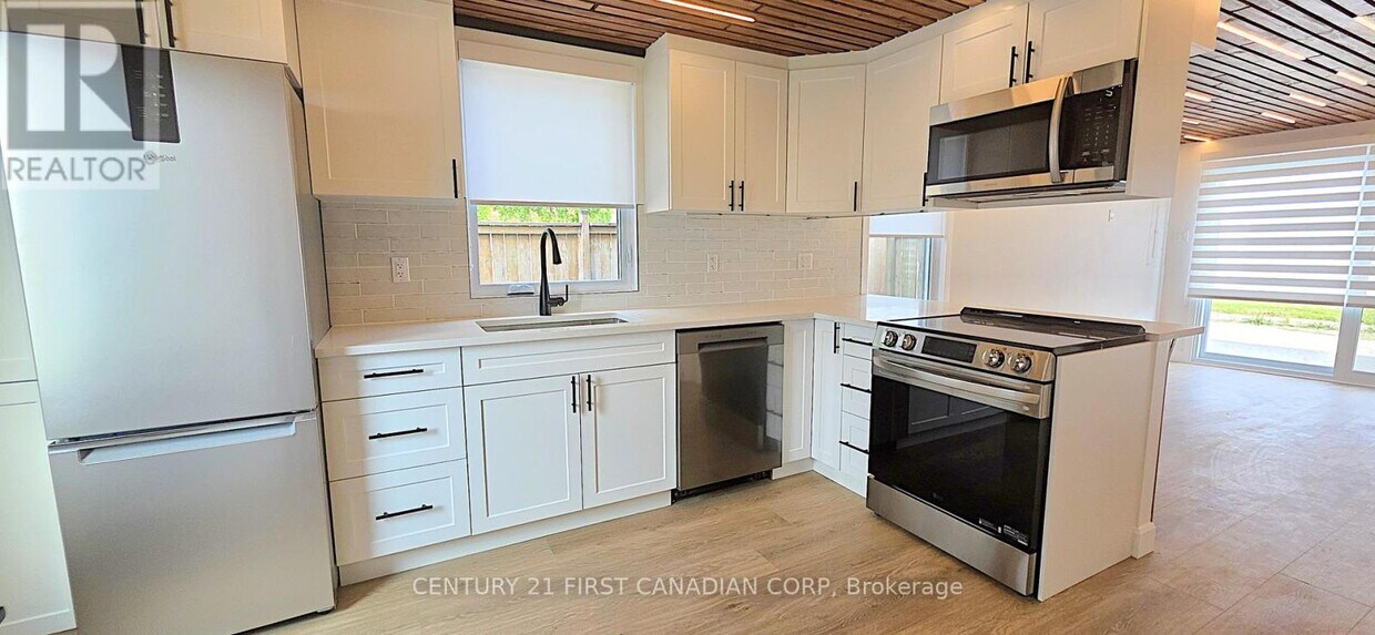 Photo principale - 857-857 Dundas St