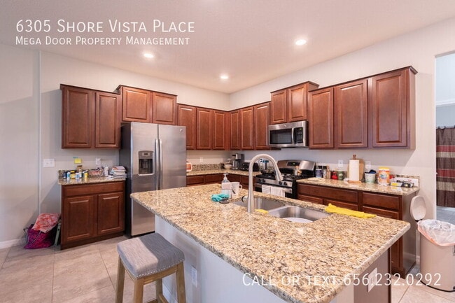 Foto del edificio - 6305 Shore Vista Pl