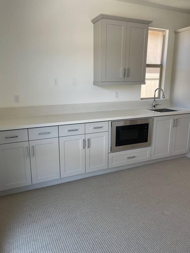 Living area with Kitchenette - 955 Lindbergh Dr