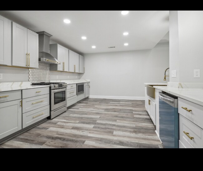Foto del edificio - 8591 Wakefield Ave