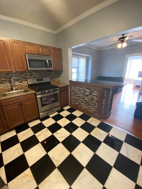 kitchen with stainless steel appliances - 109 Lexington Ave