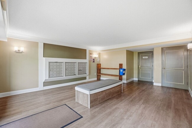 Photo - This expansive ground level residence is set within a serene, gated garden community surrounded b... Apartment