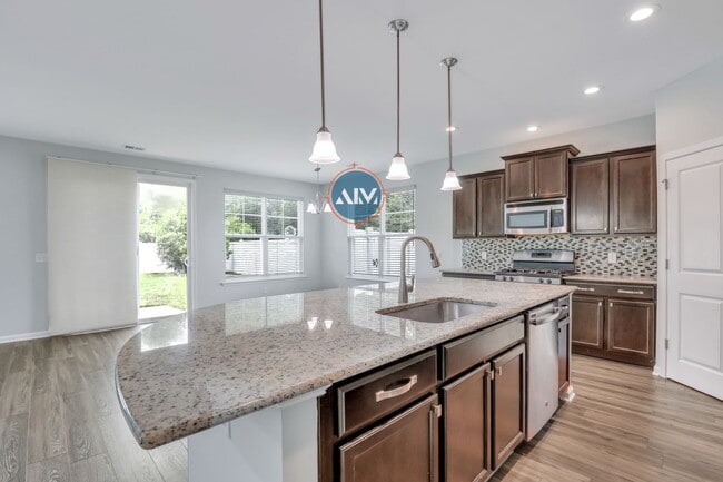 Building Photo - Gorgeous 4 bedroom House at Heritage at Ne...