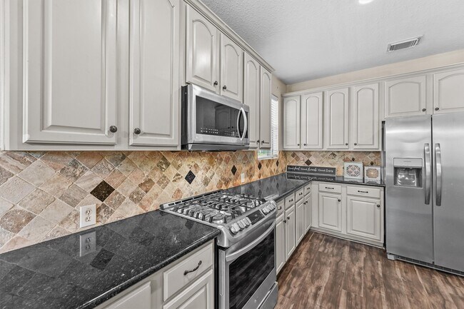 Foto del edificio - 7302 Maple Run Dr