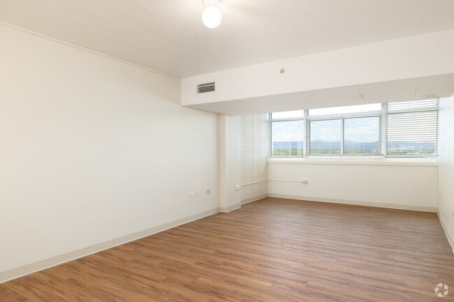 1BR, 1BA - 750SF - Living Room - Highland West Senior Citizens Apartments