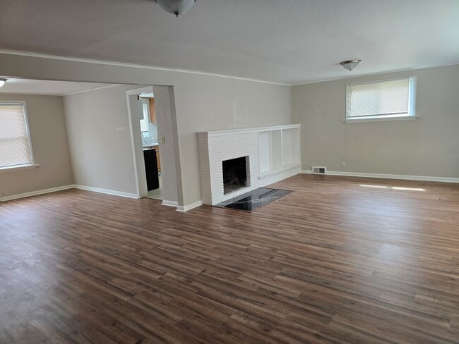 living and dining room w/ new flooring - 12105 12th Ave S