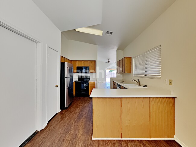 Building Photo - 10741 E Enid Ave