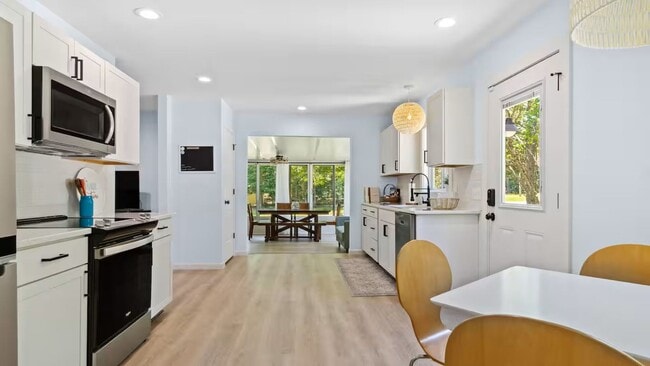 Building Photo - This FULLY FURNISHED ALL INCLUSVIE HOME IS...