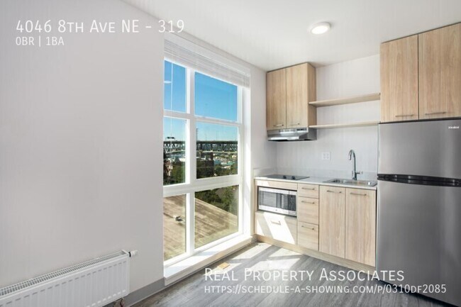 Building Photo - 4046 8th Ave NE