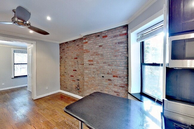Photo - 325 E 5th St Apartment