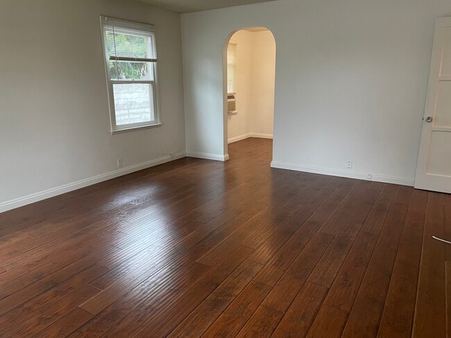 Living room thru the walk way is dining room - 1620 S 2nd Ave