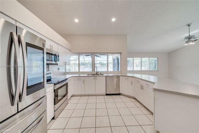 Foto del edificio - 4 br, 2.5 bath House - 360 NW 107th Ave