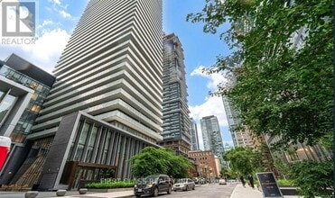 Building Photo - 50 Charles St E