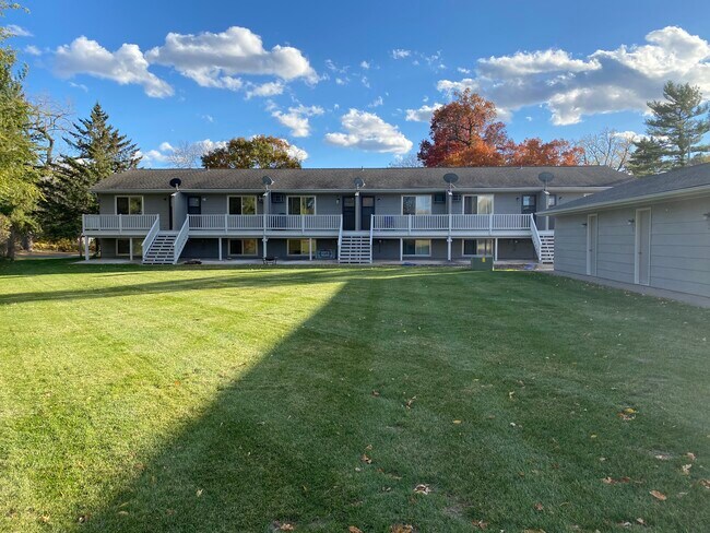 Open space in rear. Available rental is 3rd unit from left. - 3709 229th Ln NW