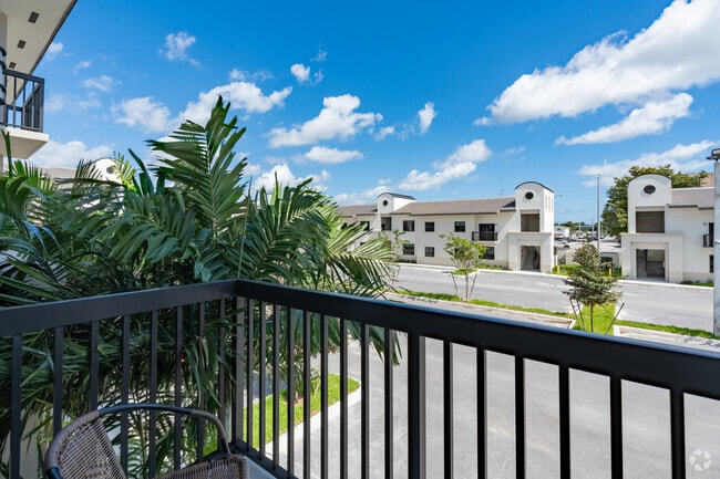 2BR, 2BA - 890SF - Balcony - Flamingo Village