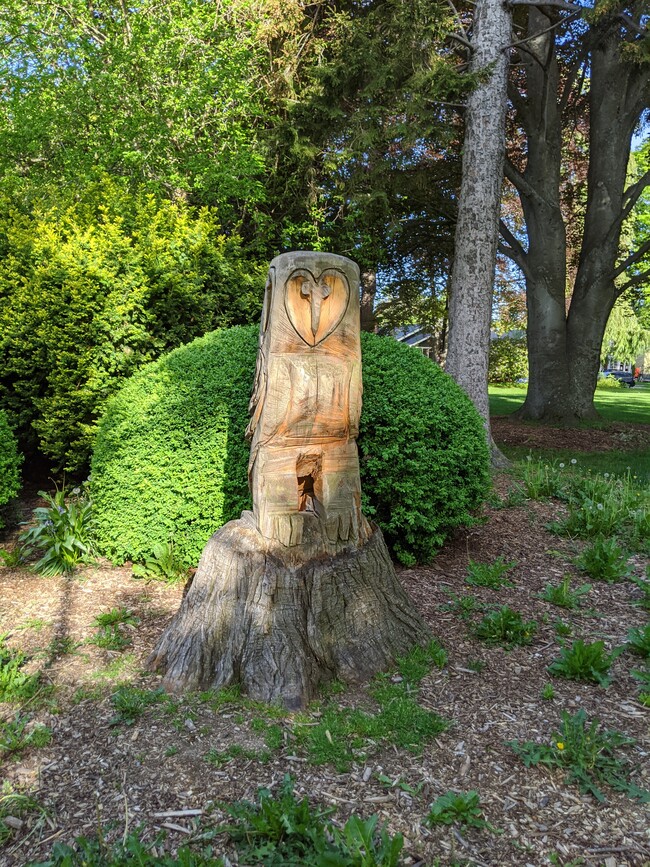 The owl carved from a stump accross from our home is a neighborhood landmark. - 2123 Park St