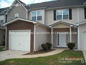 Building Photo - 407 Bedrock Pl