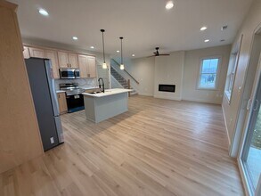 Building Photo - 6711-6715 New Town Ave