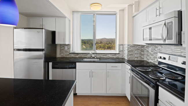 Kitchen with Stainless Steel Appliances - 55 West Fifth