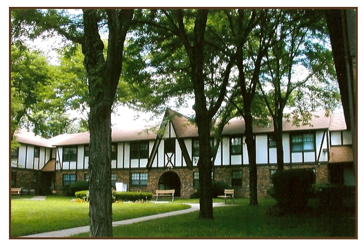 Building Photo - Tudor Gardens